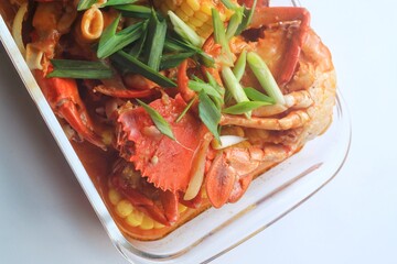 Delicious Crab in Padang sauce or an Indonesian seafood dish of crab served in hot and spicy Padang sauce with corn.
