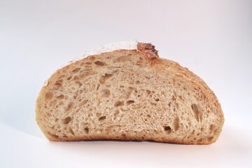 Country loaf sourdough bread on woodden table. Fresh fragrant bread on the table. Food concept. Healthy Food.

