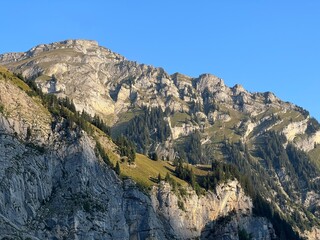 Rocky alpine peaks above Lake Melchsee or Melch Lake in the Uri Alps mountain massif, Kerns - Canton of Obwalden, Switzerland (Kanton Obwald, Schweiz)