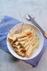 Odeng - Korean fish cake skewer in soup
