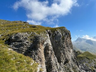 Rocky alpine peaks above Lake Melchsee or Melch Lake in the Uri Alps mountain massif, Kerns - Canton of Obwalden, Switzerland (Kanton Obwald, Schweiz)