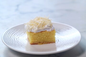 Sliced Sponge Cake , fresh baked fluffy cake with cheese topping