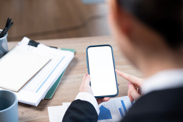 Top view Woman sitting and holding blank screen mock up mobile phone