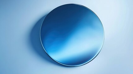 Smooth Circular Surface in Shades of Blue Against Light Background