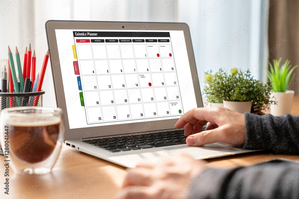 Poster calendar on computer software application for modish schedule planning for personal organizer and on
