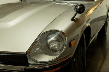 Fototapeta premium Headlight and mirror of a classic Japanese car -1