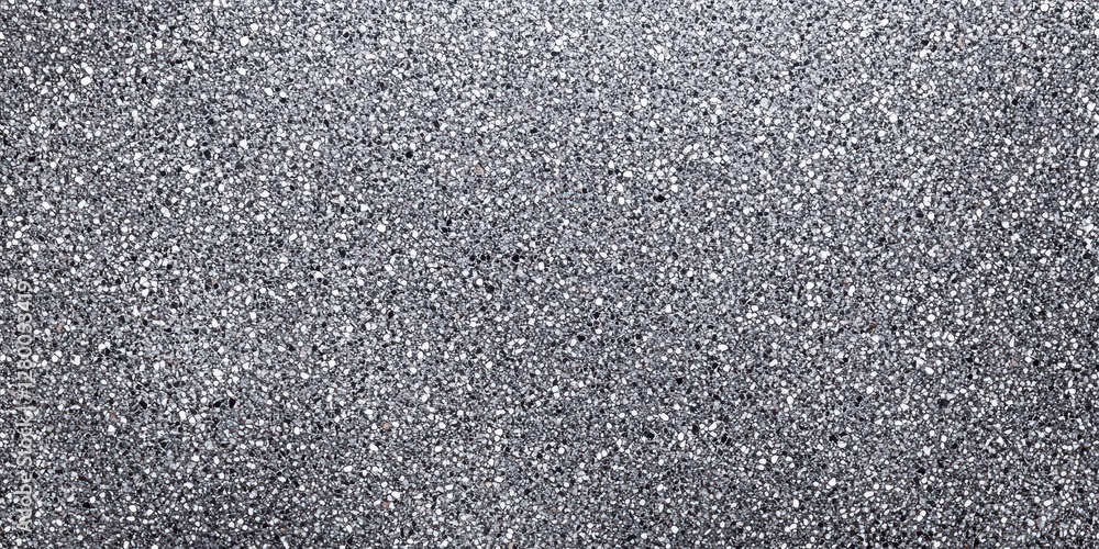 Poster sandpaper textured surface with a shimmering gray appearance.