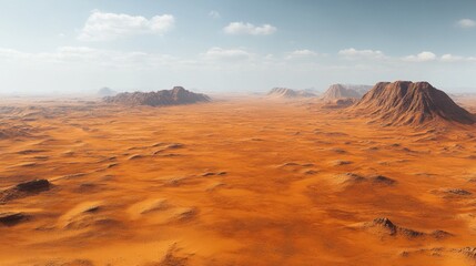 Naklejka premium Expansive desert landscape with distant mountains under a partly cloudy sky.