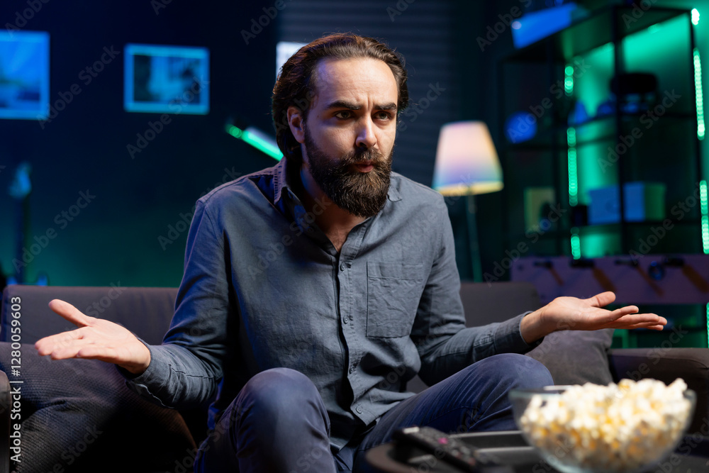 Poster puzzled person on couch using tv to binge thriller series on subscription based streaming services, 