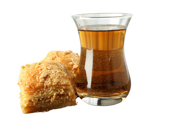 PNG, Ramadan. Baklava in a plate with a glass of tea,.isolated on a white background.