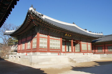 Fototapeta premium Heumgyeonggak, a traditional Korean pavilion. Red paint and tiled roof. Located in South Korea. This was once a royal astronomy observatory, reflecting the scientific achievements of the Joseon
