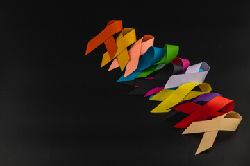 Colorful ribbons symbolize support for various health campaigns