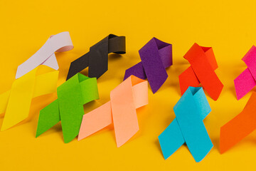 Colorful awareness ribbons represent various health campaigns for all