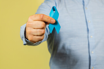 Fototapeta premium Support for men's health awareness with a blue ribbon