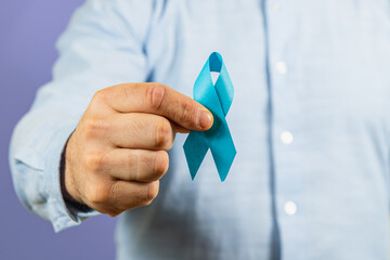 Support for cancer awareness with blue ribbon initiative for men's health