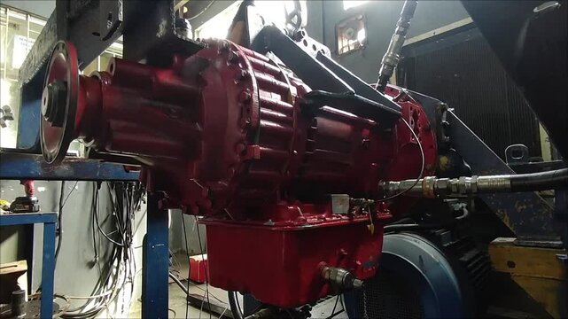 Allison Transmission HT 750 and CLT 750 series Dyno Test in a Professional Automotive Workshop or Test bench at Balikpapan. Red color