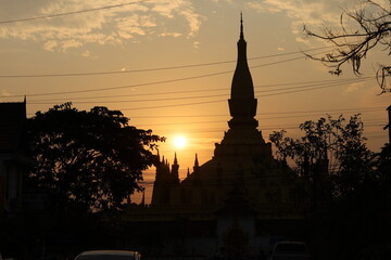 Obraz premium Sunset at That Luang Stupa Vientiane