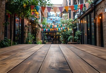 Fototapeta premium Charming urban courtyard with wooden table in foreground and colorful bunting, surrounded by lush greenery and inviting atmosphere for gatherings