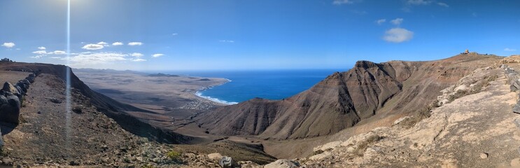 Lanzarote Canary Islands panoramic view of island with volcanic hills, lava fields and beautiful coastline scenery.