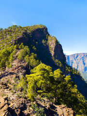 the peak of the bejenado mountain with the Caldera de Taburiente in the background (La Palma, Canaries, Spain)
