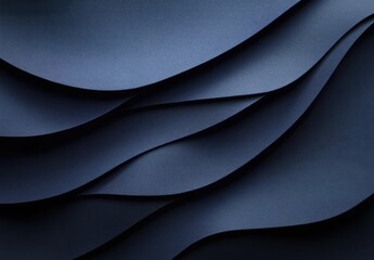 Obraz premium Smooth Curving Layers of Deep Blue Fabric Creating Elegant Textures and Soft Shadows in a Modern Design Setting