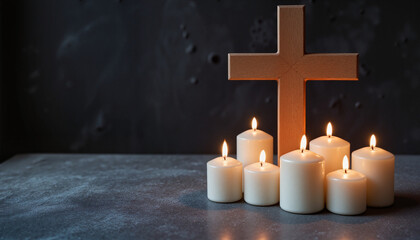 Serene candles surrounding a wooden cross on a softly textured outdoor background