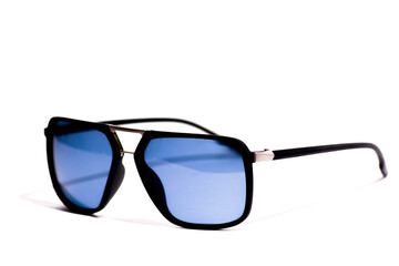 Sunglasses with black frame and blue glasses. Sun glasses. Modern blue sunglasses on white...