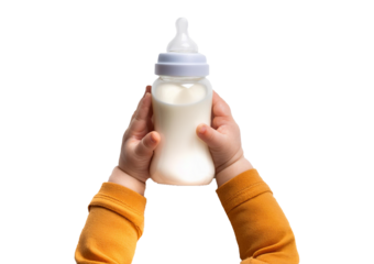 Baby's hand holding a milk bottle Isolated on transparent or white Background, top view, close up