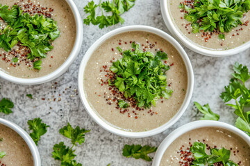 Nutritious quinoa soup with fresh parsley garnish