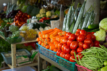 Colorful Assortment of Fresh Tropical Fruits Displayed at a Vibrant Traditional Market Stall