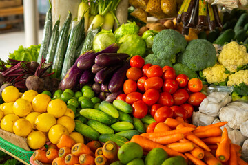 Colorful Assortment of Fresh Tropical Fruits Displayed at a Vibrant Traditional Market Stall