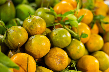 Fresh Juicy Oranges Displayed at a Traditional Market Stall – Vibrant Citrus Fruit for Sale