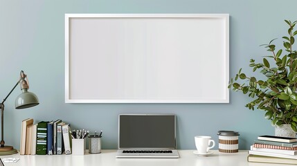 A white rectangular frame above a desk in a home office, surrounded by a laptop, books, and a coffee mug.  HD 8K mockup wallpaper Photographic Image