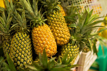 Fresh Ripe Pineapples Displayed at a Traditional Market Stall – Tropical Fruit for Sale in a Local Market