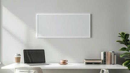 A white rectangular frame above a desk in a home office with a laptop, a cup of coffee, and a small pile of books.  HD 8K mockup wallpaper Photographic Image