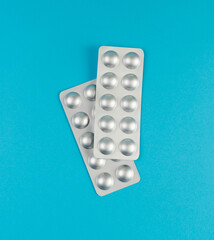 Pill Blister on Color Background, Silver Medicine Capsule Package, Drugs Packaging, Pill Pack