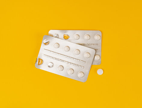Pill Blister on Color Background, Silver Medicine Capsule Package, Drugs Packaging, Pill Pack