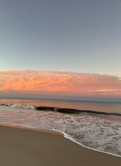 Fototapeta premium sunset waves on the beach