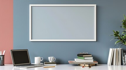 A white rectangular frame above a desk in a modern home office, surrounded by a coffee cup, a laptop, and a stack of books.   HD 8K mockup wallpaper Photographic Image