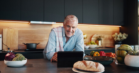 Mature man, tablet and portrait with recipe tutorial, dinner method or online guide in home....