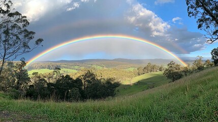 Fototapeta premium Rainbow Over Rolling Hills