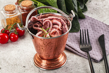 Marinated squid tentacles in the bowl