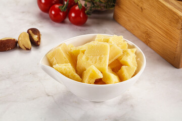 Crushed parmesan cheese in the bowl