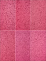 Fototapeta premium A close up of a pink carpet with a pink background. The carpet is made up of six different shades of pink
