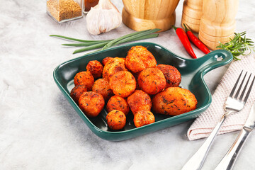 Baked young potato with paprika