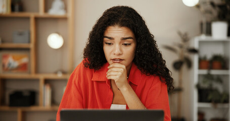 Confused, laptop and thinking with woman in home office for research, planning and ecommerce sales feedback. Worry, idea and dropshipping small business with person for negative online review