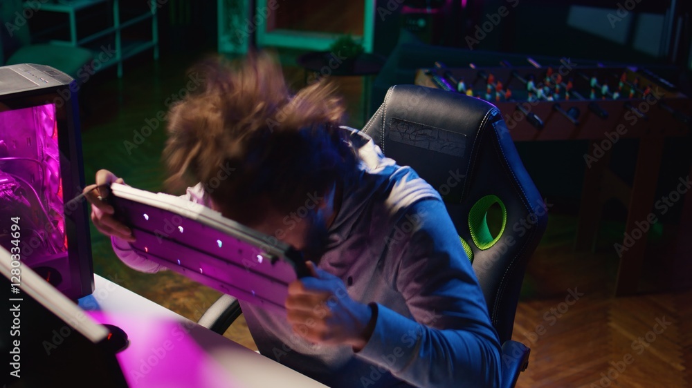 Aufkleber angry gamer raging after losing against opponent in online esports competition. upset player smashin