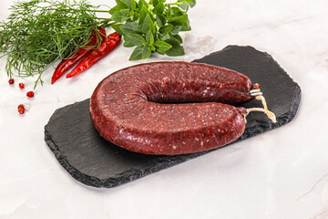 Delicious dry cured beef basturma on table, closeup