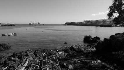 A ship and boats in the Moroni port
