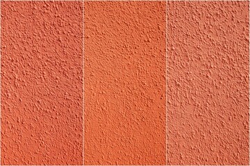 Fototapeta premium Three different shades of orange are shown side by side. The colors are warm and inviting, creating a cozy and comfortable atmosphere